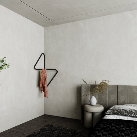 Modern wall mounted corner clothes hanger with sculptural design علاقة ملابس حائطية بتصميم هندسي عصري مثبتة في زاوية الحائط