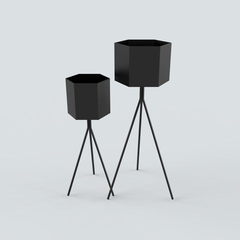 Contemporary hexagonal planter pot with stylish tripod base for indoor or outdoor plants وعاء زرع سداسي عصري بقاعدة ثلاثية أنيقة