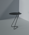 Angolo modern side table featuring a sleek black metal design, perfect for minimalist and contemporary spaces.