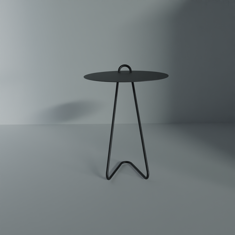 Angolo modern side table featuring a minimalist design with a round top and stylish legs, ideal for contemporary spaces.