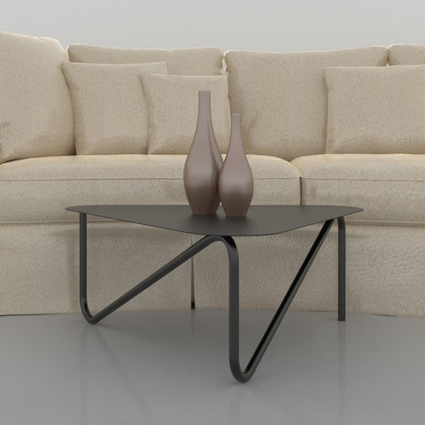 Triangular modern metal coffee table with sculptural legs in living room طاولة قهوة معدنية عصرية بشكل مثلث وأرجل نحتية في غرفة المعيشة