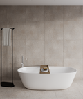Alto Freestanding Towel & Clothes Stand — styled interior view | حامل ألتو القائم للفوط والملابس — ضمن تنسيق داخلي
