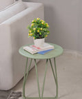 Stratto Sculptural Metal Side Table — product photograph | ترابيزة جانبية ستراتو المعدنية بتصميم نحتي — صورة للمنتج